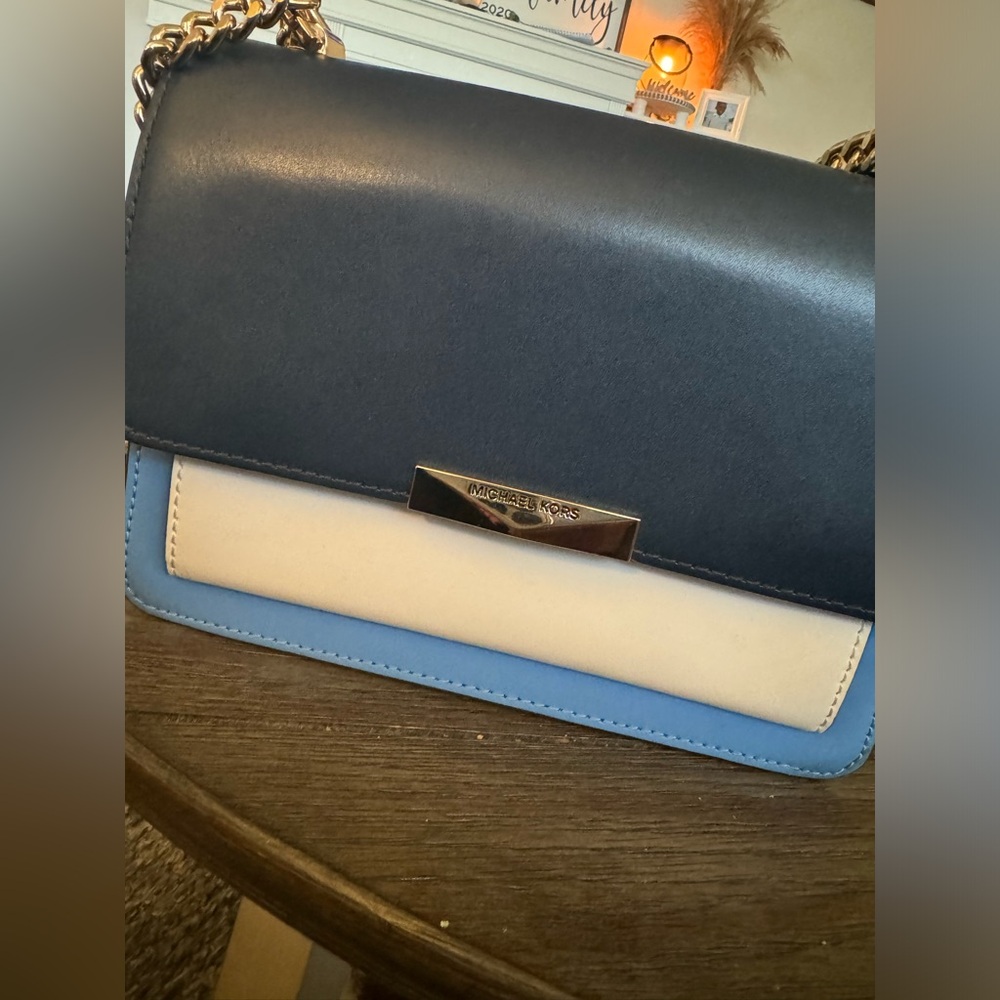 Great condition Michael Kors purse and matching wristlet wallet.